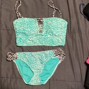 Turquoise and white leopard print M swim suit